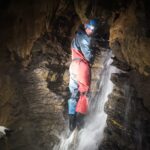 Wet caving adventure, the Mendips, N. Somerset