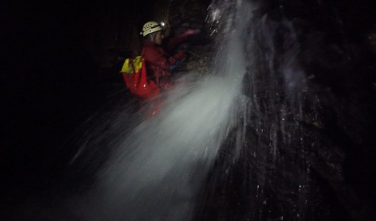 Neil at the bottom of the 8ft waterfall in Swildon’s Hole