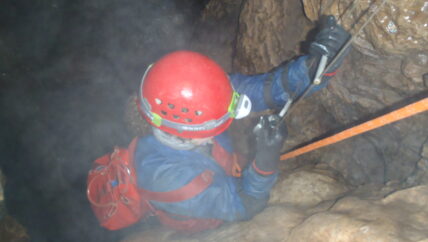 Wet adventure caving - ladder descent!