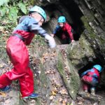 Youth group exploring a cave